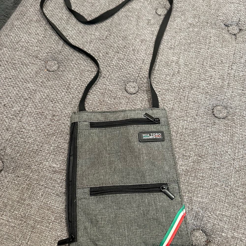 Gray and Black Messenger Bag with Durable Fabric and Structured Shape